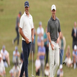 Rory McIlroy and Brooks Koepka look on during the 2023 U.S. Open