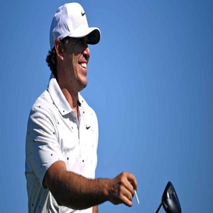 Brooks Koepka smiles during a practice round at Torrey Pines
