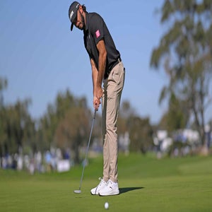 Max Homa of the United States putts on the tenth hole during the first round of the Farmers Insurance Open 2026 at Torrey Pines South Course
