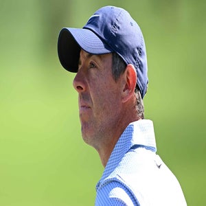 Rory McIlroy of Northern Ireland looks across the 18th green, during day one of the Hero Dubai Desert Classic 2026 at Emirates Golf Club