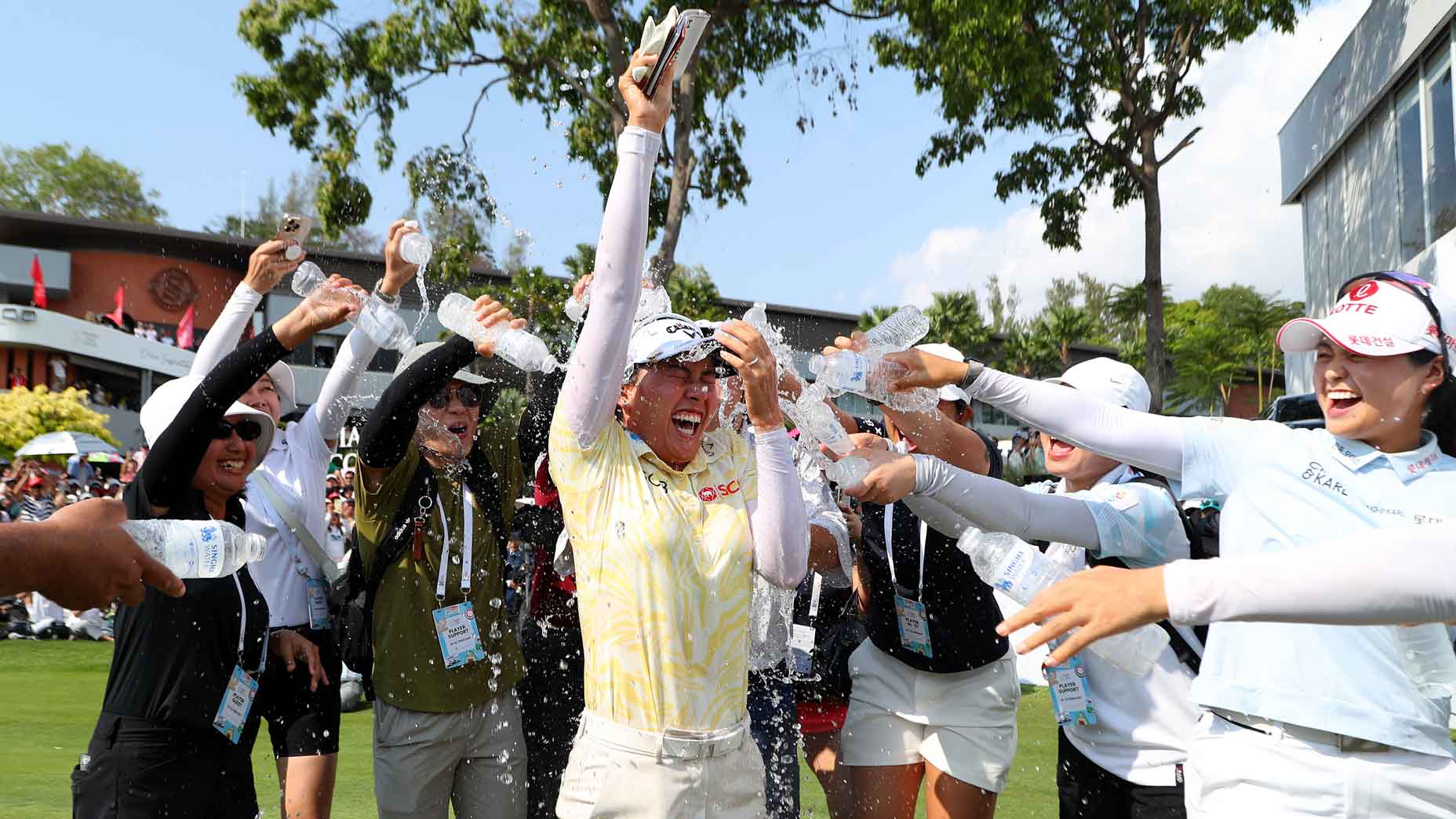 Jeeno Thitikul of Thailand is congratulated with water as she celebrates victory following the final round of the Honda LPGA Thailand 2026 at Siam Country Club on February 22, 2026 in Chon Buri, Thailand. (Photo by Thananuwat Srirasant/Getty Images)
