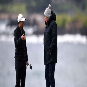 collin morikawa consults rules official at Pebble Beach during AT&T Pebble Beach Pro-Am