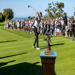 Justin Rose tees off at the Farmers Insurance Open