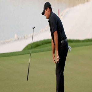 Patrick Reed reacts to a missed putt at the Bahrain Championship