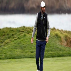 Scottie Scheffler looks on at Pebble Beach