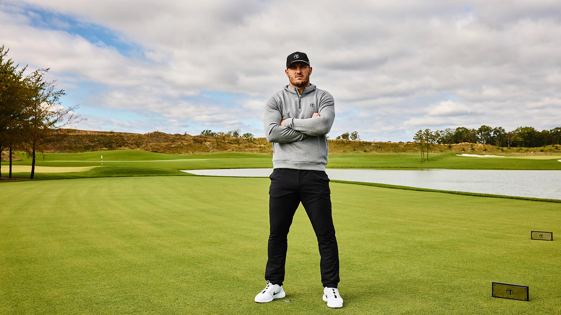 mike trout folds arms at trout national during golf magazine photoshoot