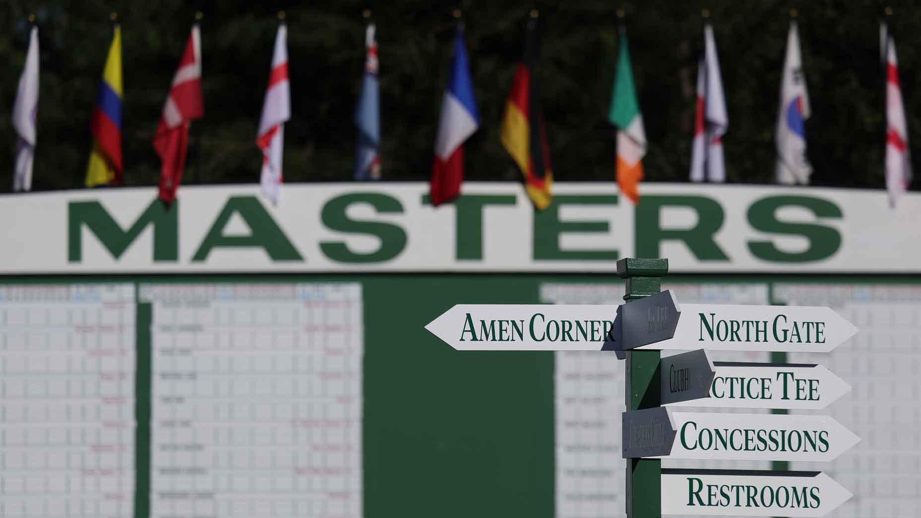2026 Masters dates: A view of course signage by a scoreboard at Augusta National.