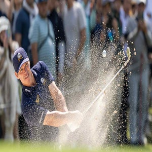 Paul Casey from Crushers GC hits a bunker shot