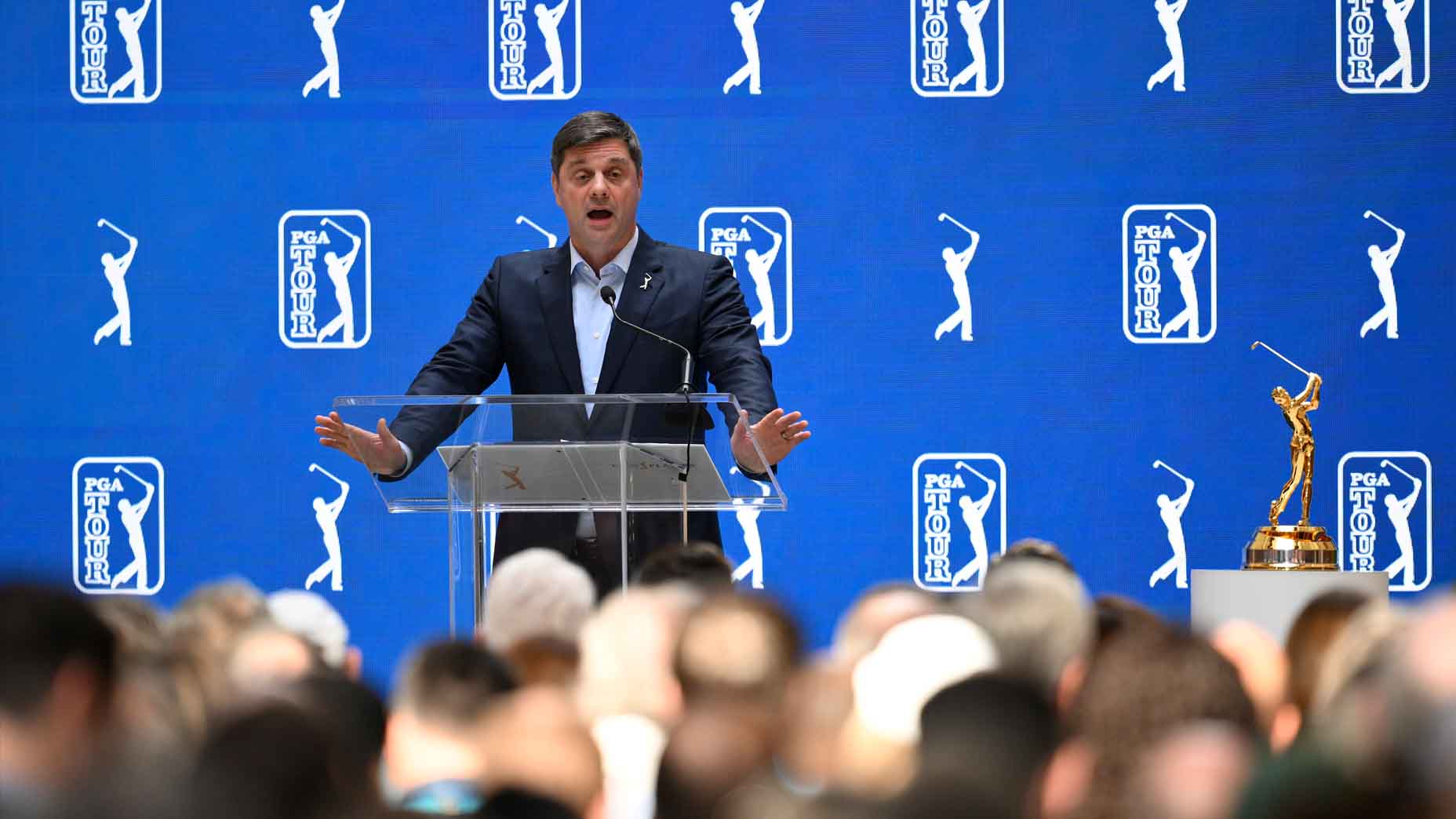 Brian Rolapp addresses the media