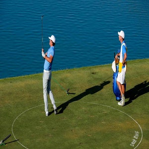 brooks koepka swings from players championship drop zone at the 17th hole