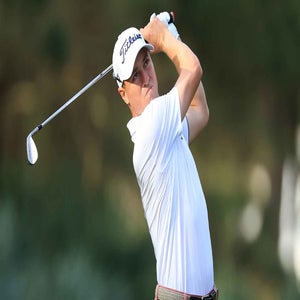 justin thomas swings wedge at the palyers championship