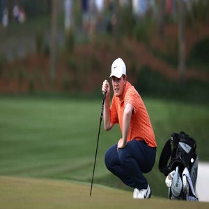 Robert MacIntyre surveys a putt at the Players Championship
