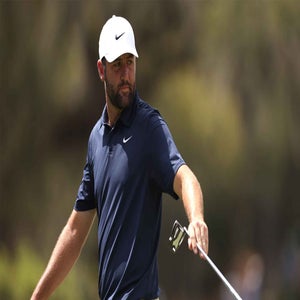 Scottie Scheffler looks on during the Players Championship