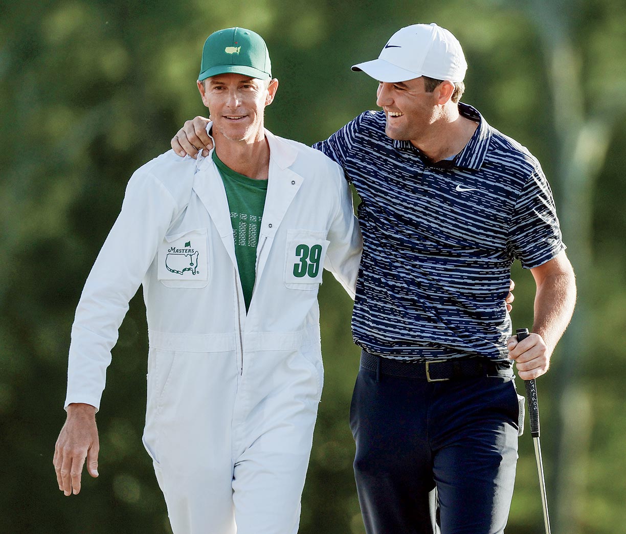 Ted Scott and Scottie Scheffler celebrate their first Masters win in 2022, a three-stroke victory over eventual Champions Dinner mate Rory McIlroy.