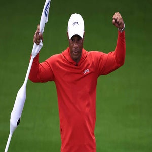 Tiger Woods celebrates during the 2026 TGL finals match.