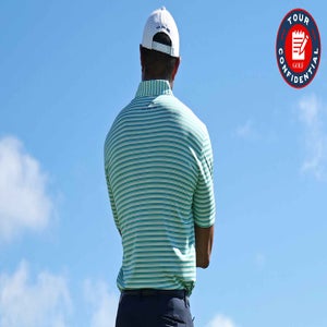 Tiger Woods of the United States looks on from the driving range ahead of the third round of the Hero World Challenge 2025 at Albany Golf Course