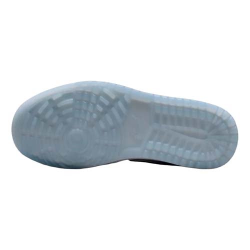 The image shows the translucent, icy blue outsole of one of the best Jordan golf shoes, featuring a patterned tread for grip and traction. The shoe is positioned with the sole facing up against a white background.