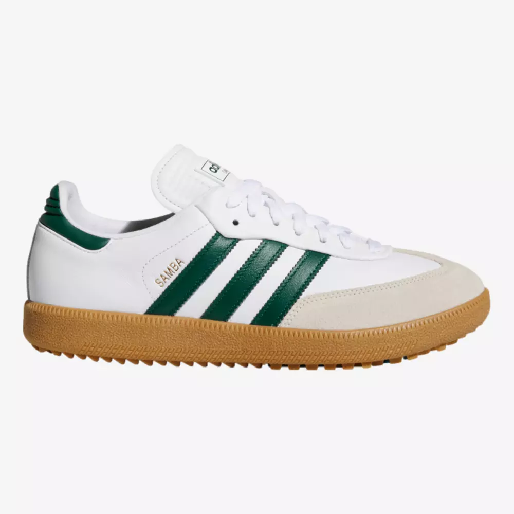 A white Adidas Samba sneaker with green stripes, a suede toe, and a gum rubber sole is shown in side profile on a plain background&mdash;an inspired look reminiscent of the best women's golf shoes 2026 collections.