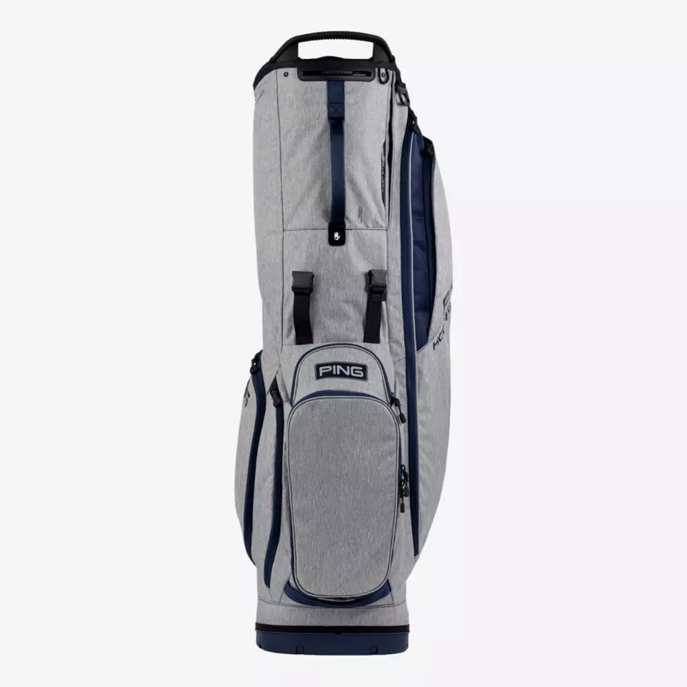 A gray and navy blue PING golf bag stands upright on a white background, featuring multiple zippered pockets, handles, and a sturdy design&mdash;perfect for golfers seeking one of the best golf bags 2026 has to offer.