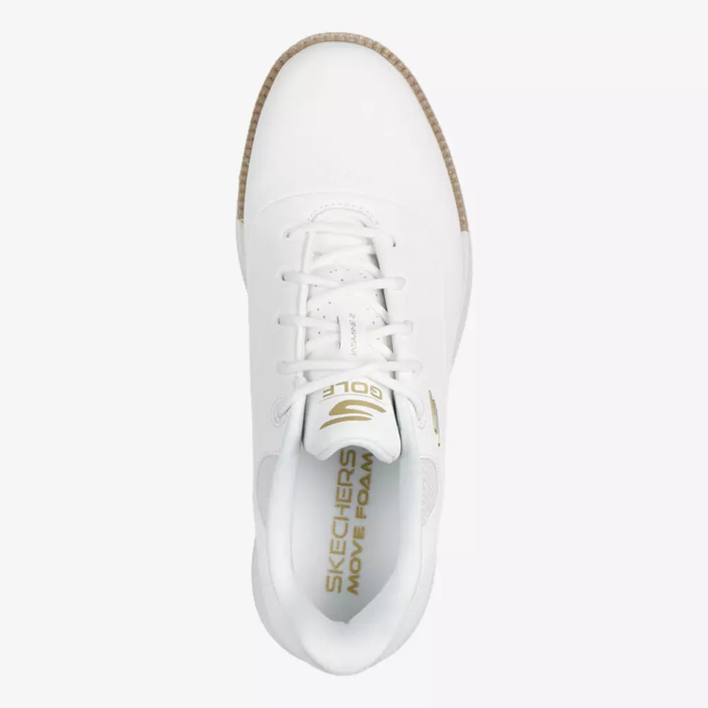 Top view of a white sneaker with white laces and a light brown sole. Gold branding on the tongue reads GOLF and SKECHERS MOVE FOAM. A clean, minimalist design makes it a contender for the best women's golf shoes 2026.