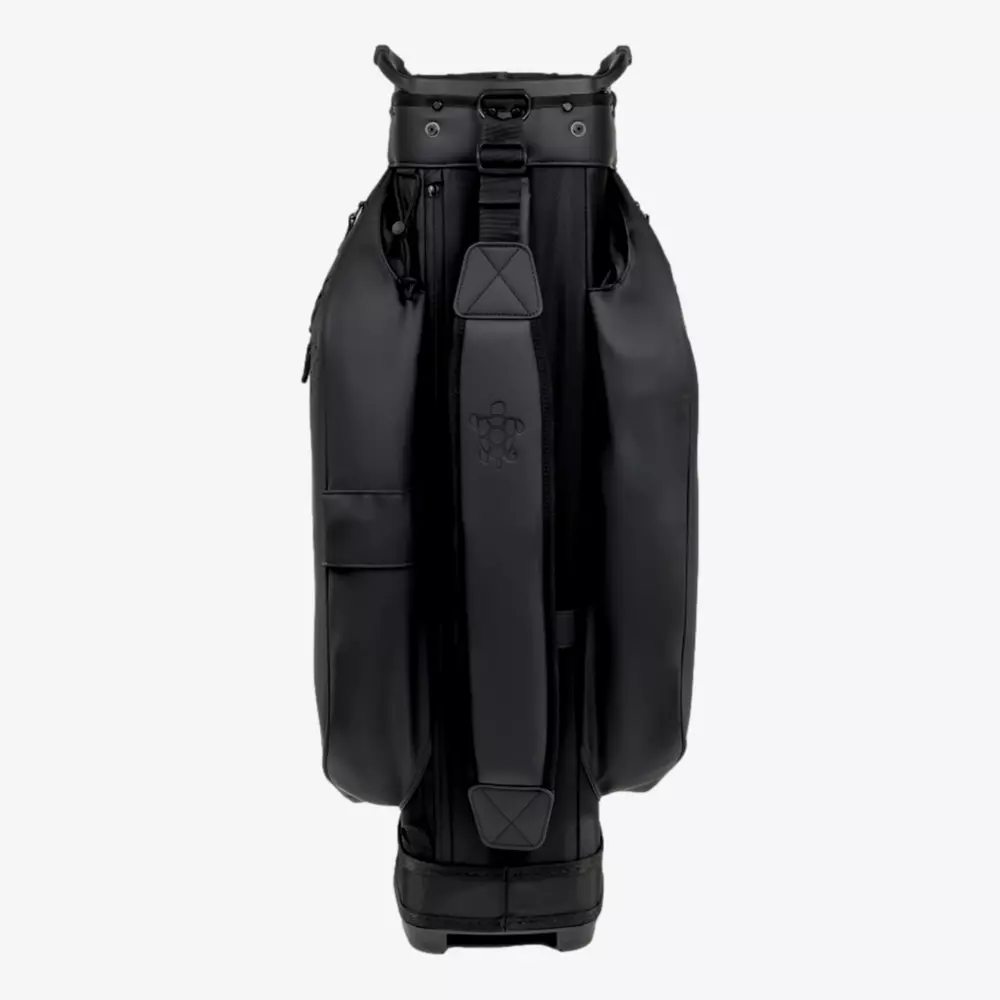 A black golf bag standing upright against a plain white background, featuring multiple pockets, a sturdy base, and a wide shoulder strap with padding for carrying comfort&mdash;an ideal pick among the best golf bags 2026.