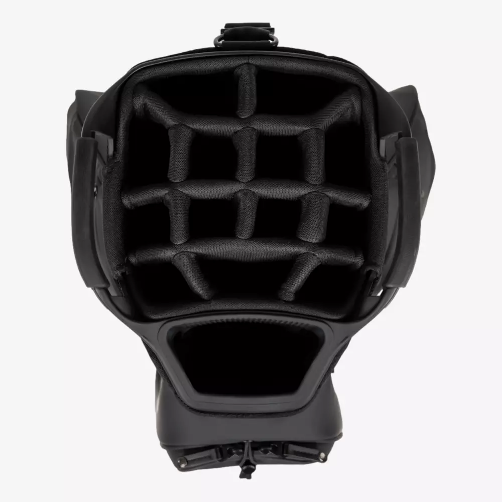 Top-down view of the interior padding and structure of a black catcher's mask, showing grid-like foam padding for protection and comfort&mdash;crafted with attention to detail like the best golf bags 2026.