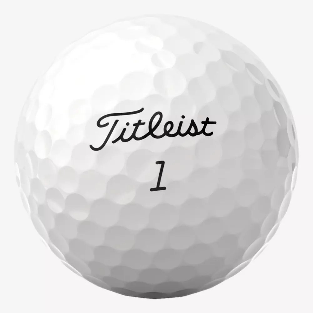 A white golf ball with dimples, featuring the word Titleist in black script and the number 1 printed below it&mdash;an ideal companion when paired with the best golf shoes 2026 for top performance on the course.