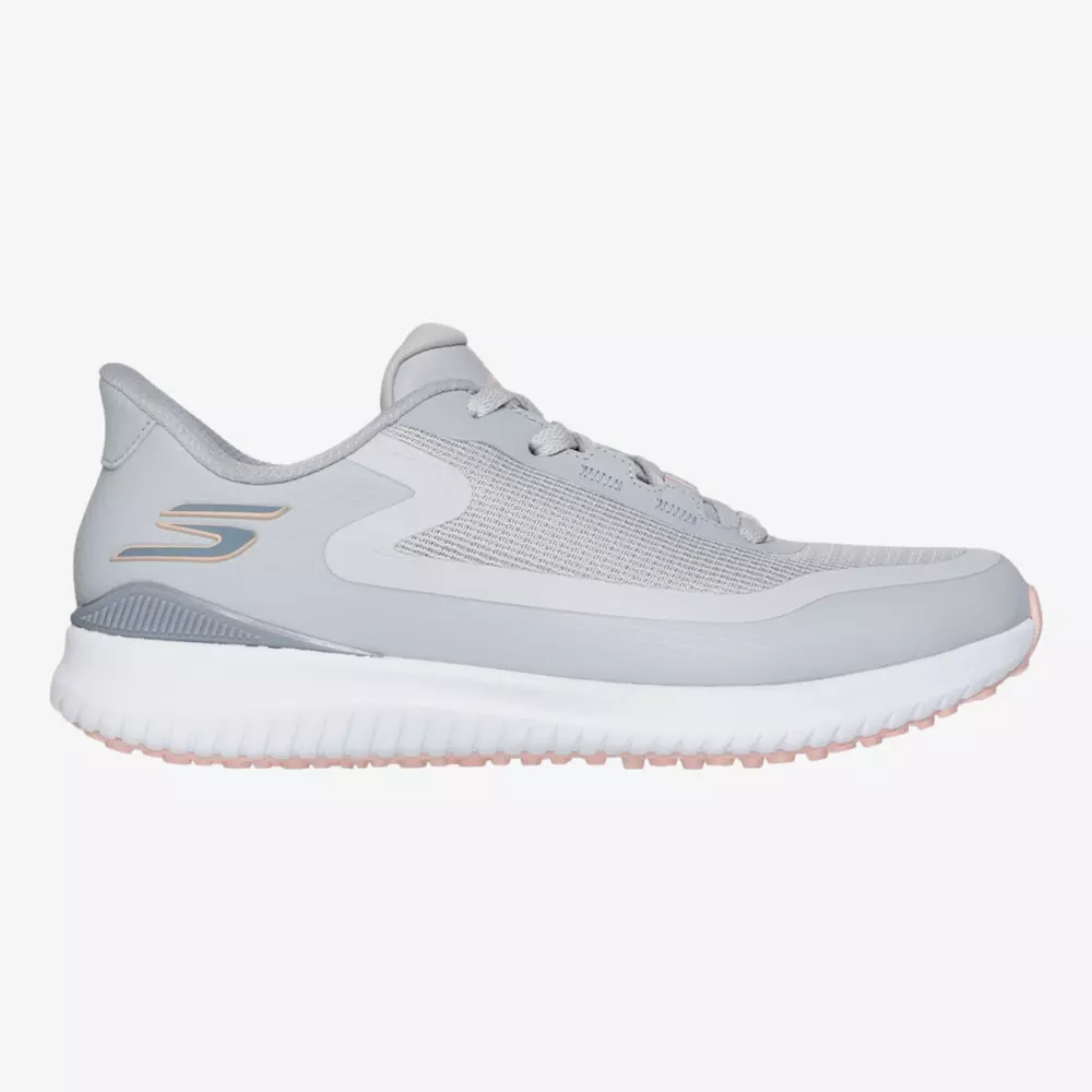 A light gray athletic sneaker with a white sole, mesh fabric upper, and subtle metallic logo on the heel&mdash;perfect for those seeking the best women's golf shoes 2026. Features light pink accents and a stylish lace-up design.