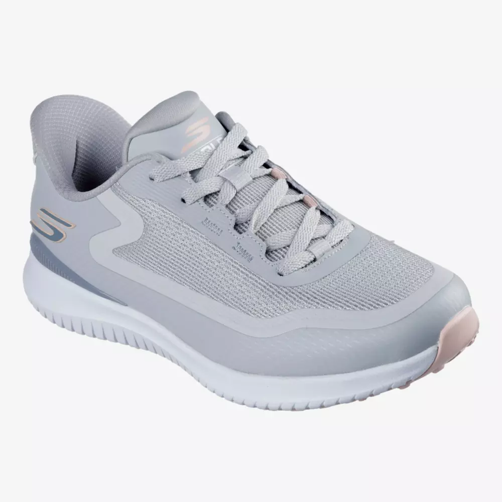 A light gray Skechers athletic sneaker, inspired by the best women's golf shoes 2026, features white and light pink accents, a mesh fabric upper, and a white textured sole&mdash;viewed from an angle showing both the side and top.
