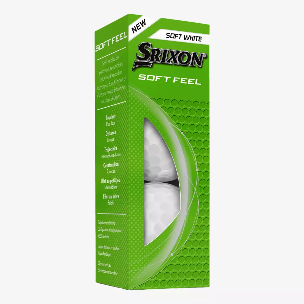 A green box of Srixon Soft Feel golf balls, labeled New and Soft White, with part of a golf ball visible through a transparent window&mdash;perfect for pairing with the best golf shoes 2026 for your next round.