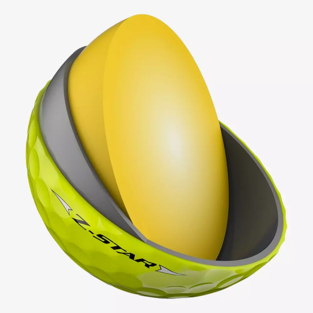 A yellow golf ball labeled Z-STAR is shown in a cross-section, revealing its layered interior structure with a yellow core and two additional layers&mdash;perfect for those seeking top performance, much like the best golf shoes 2026.