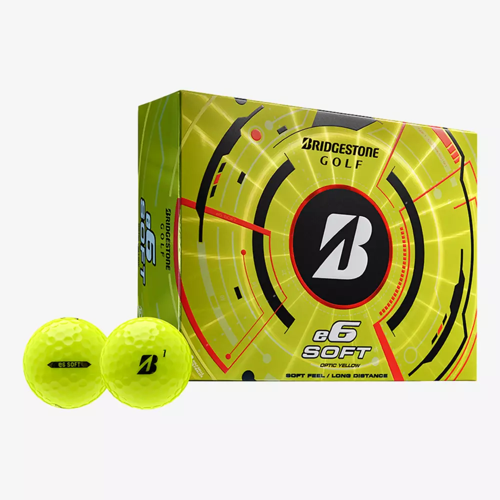 A box of Bridgestone Golf e6 Soft optic yellow golf balls with two yellow balls in front&mdash;one displaying the Bridgestone logo and the other &ldquo;e6 SOFT&rdquo;&mdash;perfect for pairing with your best golf shoes 2026 on the course.