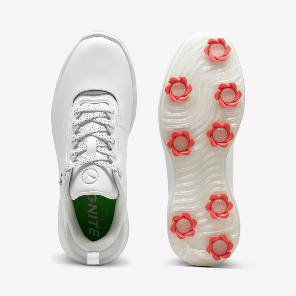 Top and bottom view of a white golf shoe. The top shows laces and a green insole with white text, while the sole displays six red spikes for traction&mdash;ideal for those seeking the best golf shoes 2026 has to offer.