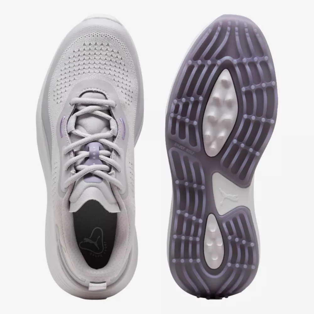 Top and bottom view of a light gray athletic sneaker with purple accents; mesh upper, laces, and textured rubber outsole showcasing tread pattern&mdash;ideal style and grip inspired by the best women's golf shoes 2026.