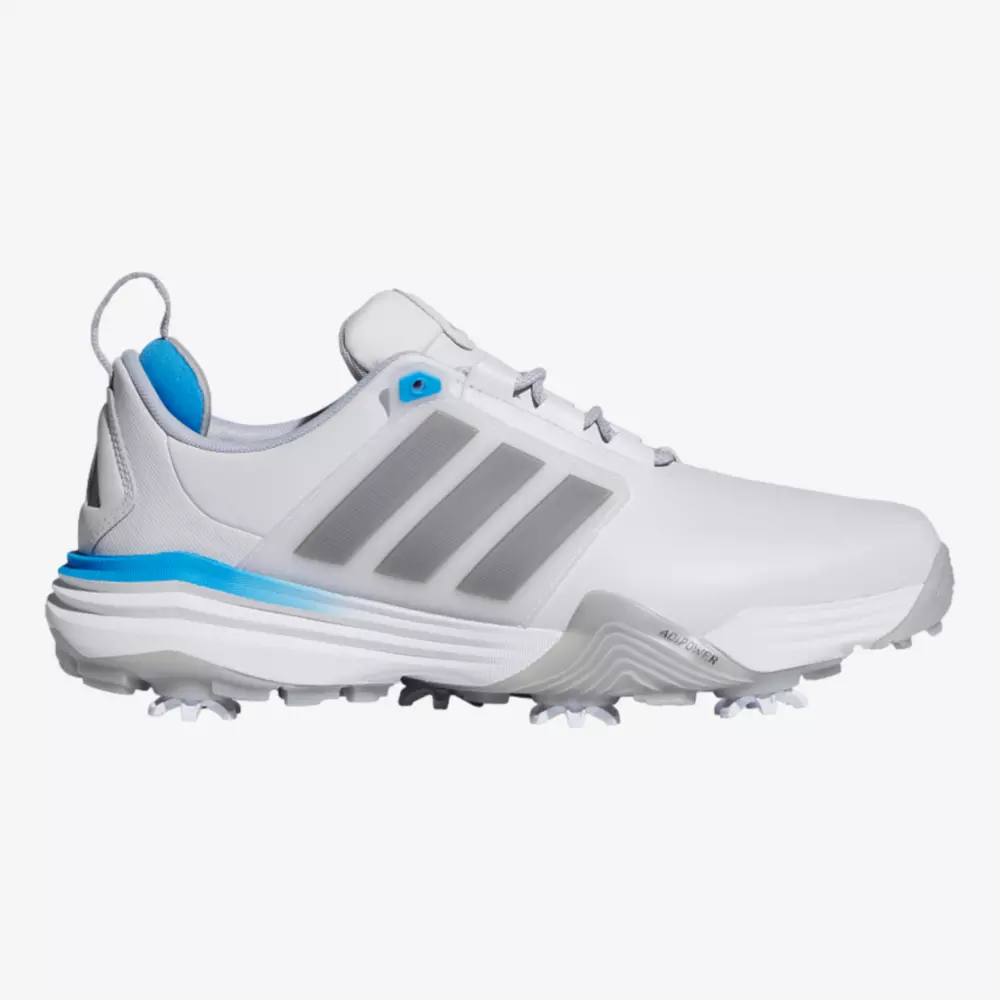 A white athletic golf shoe with gray stripes, blue accents on the heel and collar, spiked sole, and a sporty design&mdash;reminiscent of some of the best Jordan golf shoes&mdash;viewed from the side on a plain white background.
