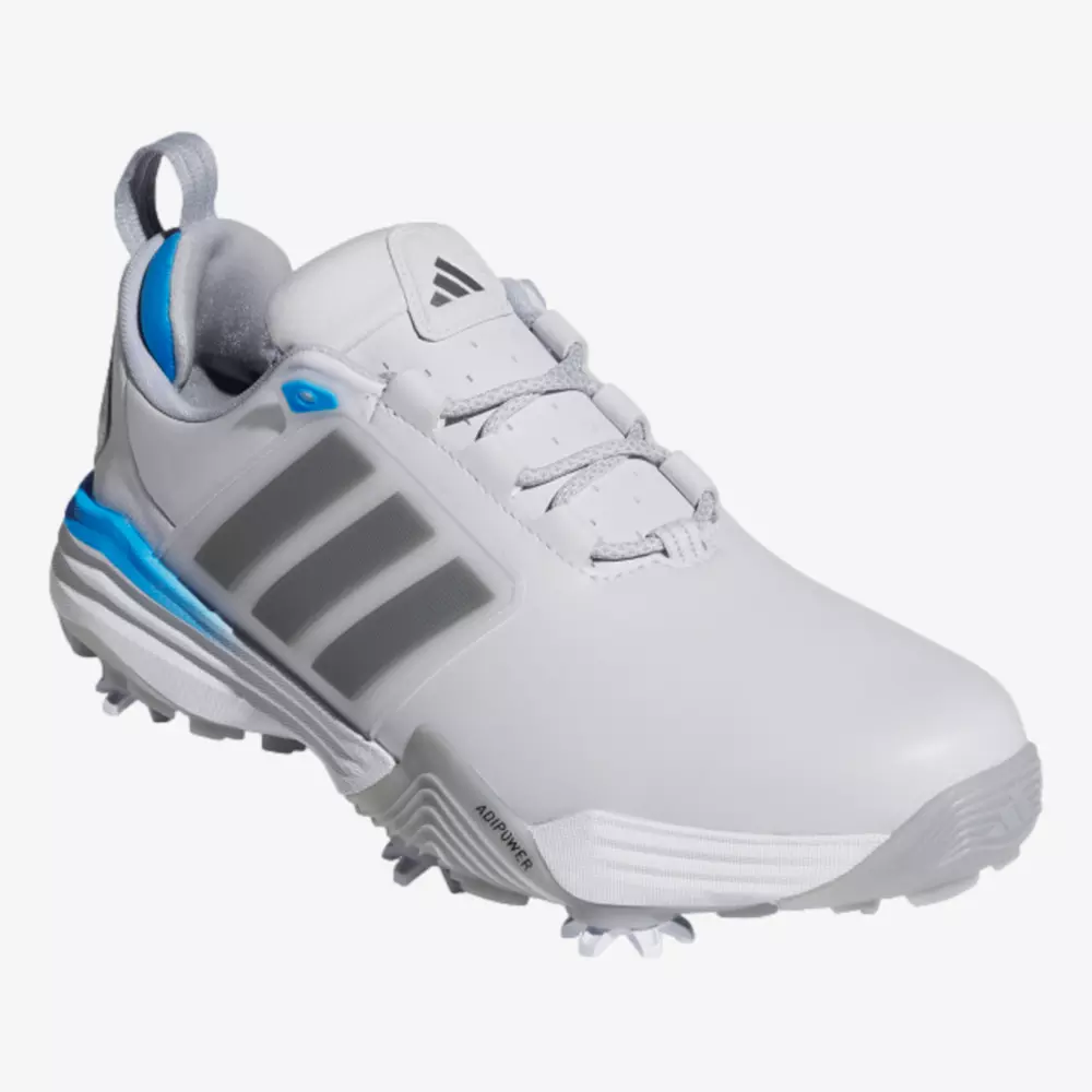 A white Adidas golf shoe with gray stripes, gray laces, blue accents near the heel, and soft spikes on the sole for traction&mdash;an excellent alternative to the best Jordan golf shoes.
