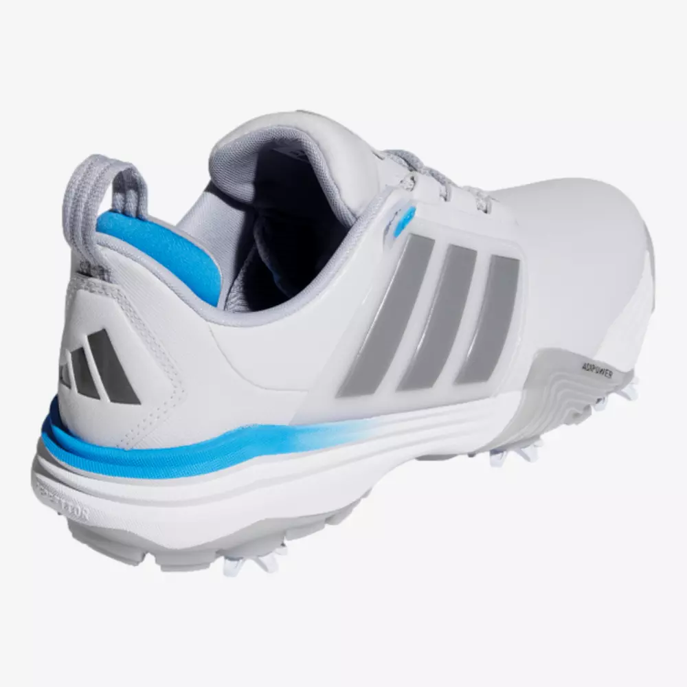 A white athletic shoe with gray stripes, blue accents, and spiked sole designed for sports. Inspired by the best Jordan golf shoes, it features a padded collar, pull tab at the heel, and a modern, sleek design.