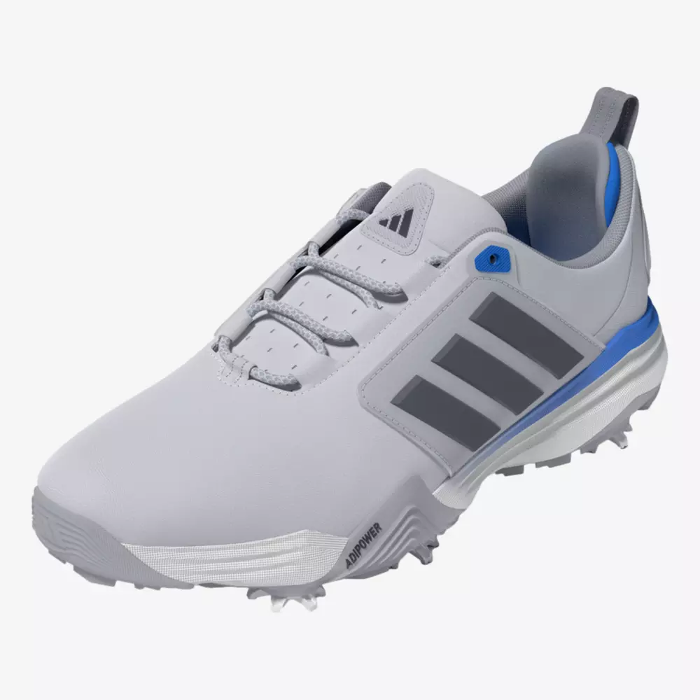 A light gray Adidas golf shoe with dark gray stripes, blue accents, and a textured sole featuring spikes for traction. Inspired by the best Jordan golf shoes, it has a sleek design and a pull tab at the heel for easy wear.