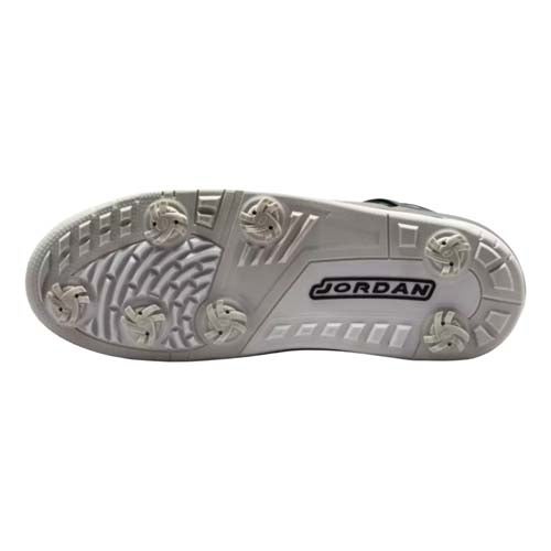 The image shows the white sole of a sports shoe with six round cleats and the word JORDAN printed in black inside a rectangular box near the arch—highlighting features found in some of the best Jordan golf shoes.