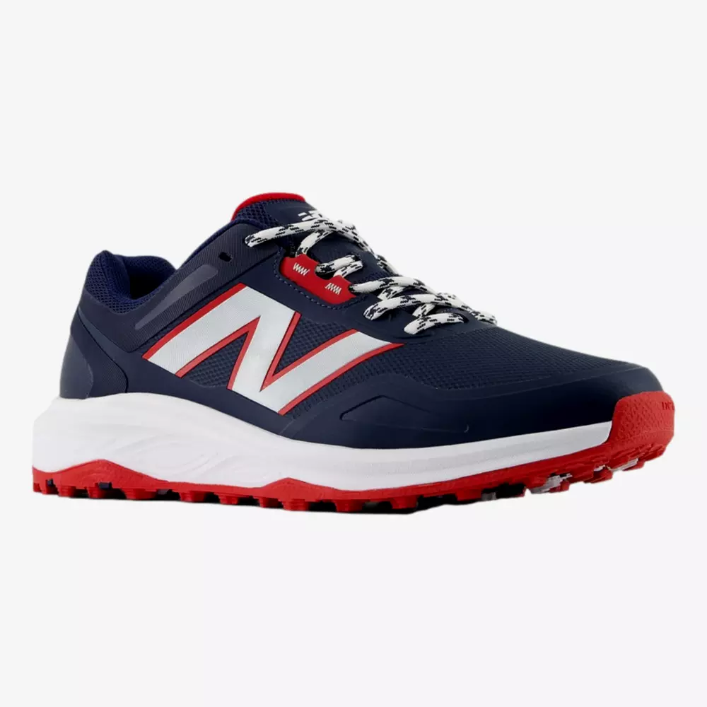 A navy blue athletic sneaker with a large white and red N logo, white and black patterned laces, a white midsole, and a red and black textured outsole&mdash;perfect for those seeking style inspired by the best Jordan golf shoes.