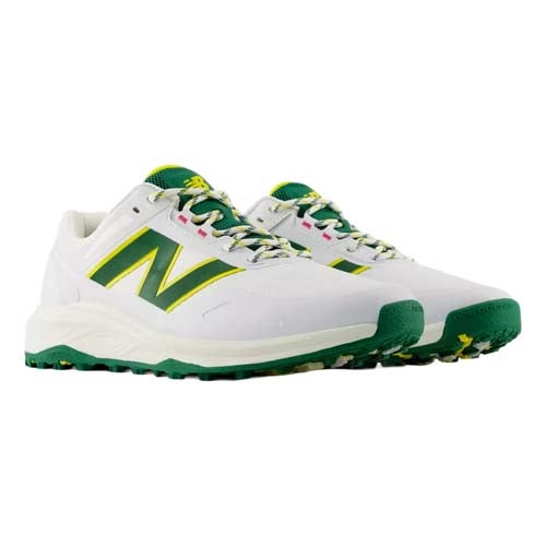 A pair of white athletic sneakers with green and yellow accents, inspired by the best looks from The First Major, featuring green soles, green and yellow N logos on the sides, and multicolored laces.