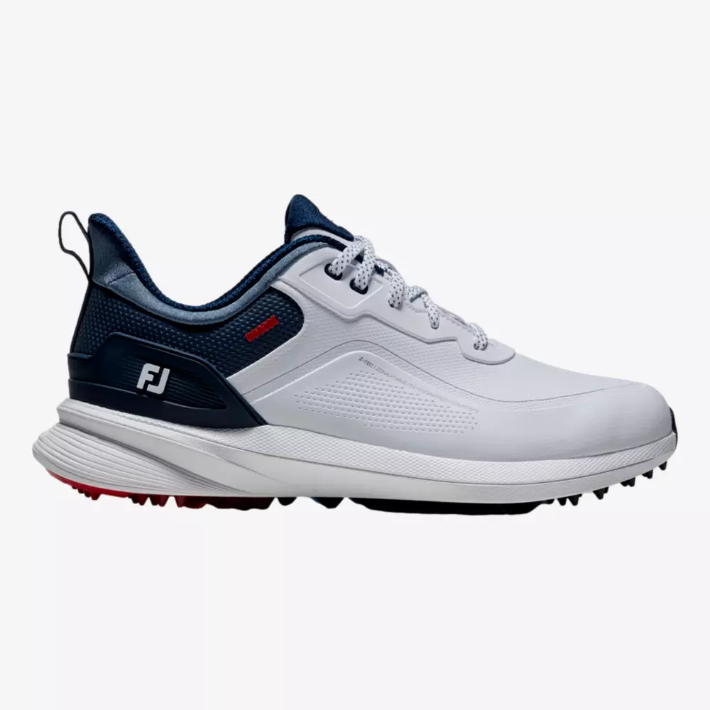 A white and navy athletic golf shoe with a lace-up design, textured sole, red accents, and FJ logo near the heel. Inspired by the best Jordan golf shoes, it features a sporty look plus reinforced heel and toe areas.