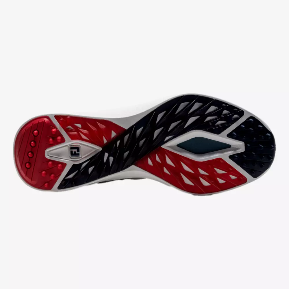 The image shows the sole of one of the best Jordan golf shoes, featuring a dynamic, lattice-like tread pattern in red, black, and white, with a logo near the heel and a small blue detail near the arch area.