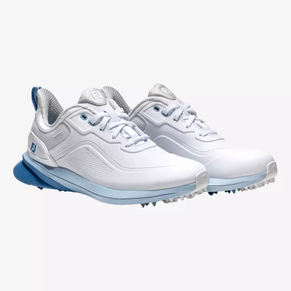 A pair of white athletic sneakers with light blue accents, textured soles, and lace-up fronts, displayed on a plain white background&mdash;perfect contenders for the best golf shoes 2026.