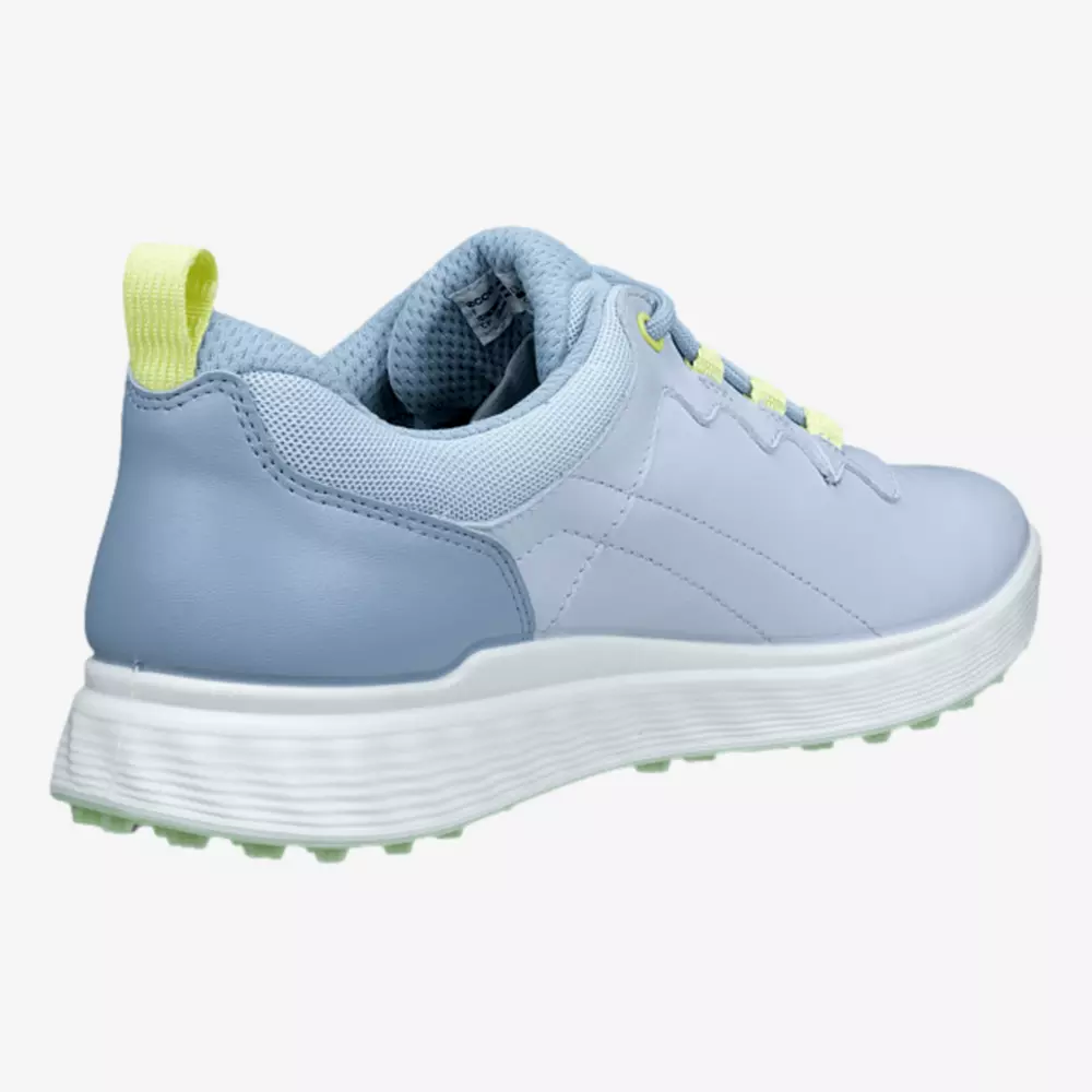 A light blue and white sneaker, inspired by the best golf shoes 2026, with a textured white sole, light green lace accents, a yellow heel tab, and a breathable mesh collar, viewed from the back side angle.