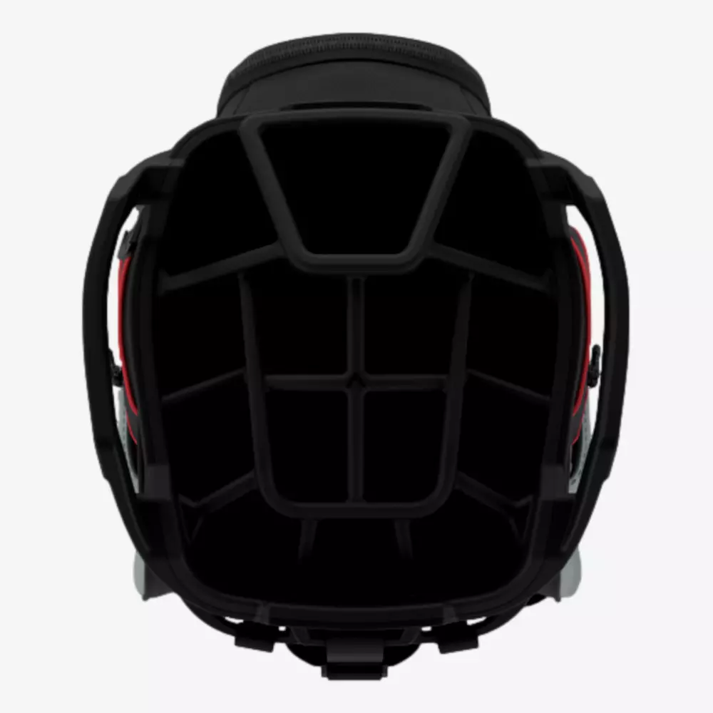A top-down view of an empty black and red helmet, showing the internal padding and strap with a segmented structure inside&mdash;crafted with precision similar to the design found in the best golf bags 2026.