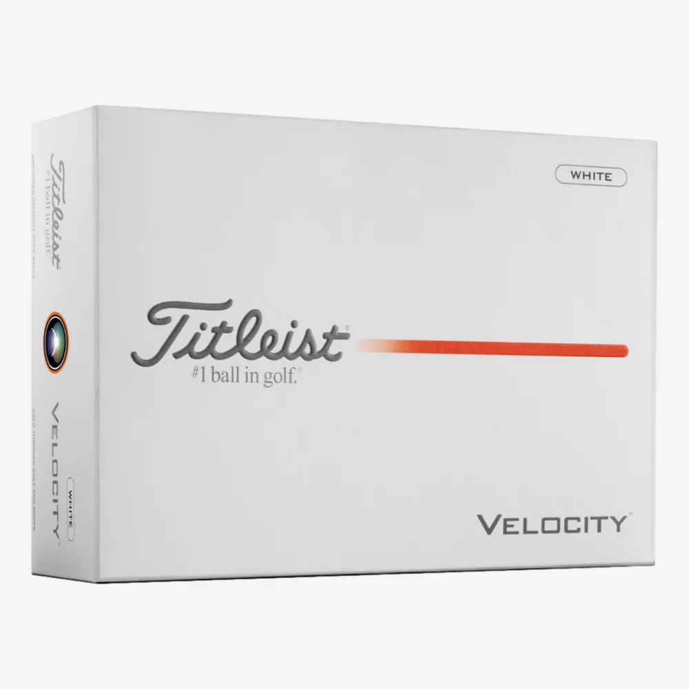 A white box of Titleist Velocity golf balls with the Titleist logo, an orange line, and the words #1 ball in golf and VELOCITY on the front&mdash;perfect for pairing with the best golf shoes 2026. A small WHITE label appears in the upper right corner.