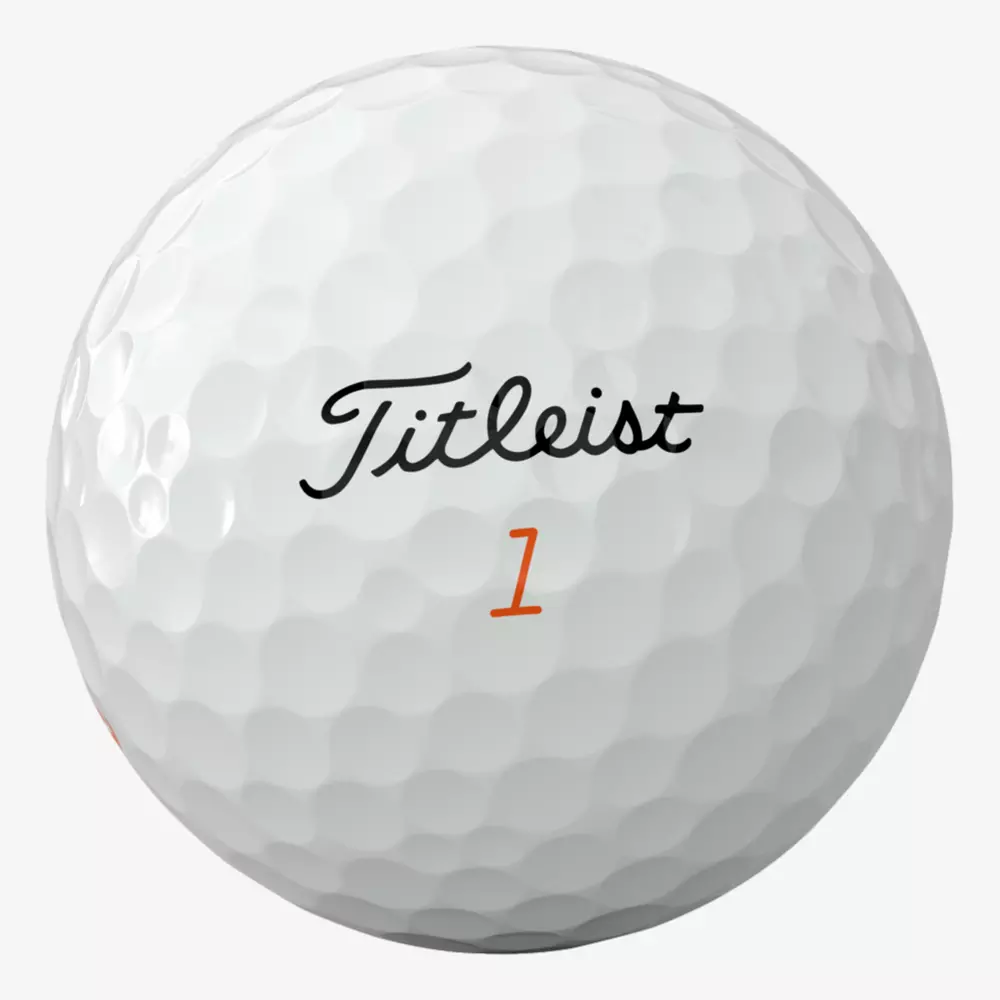 A white golf ball with dimples, featuring the black Titleist logo and an orange number 1 printed below it&mdash;a perfect match for those searching for the best golf shoes 2026 to elevate their game.