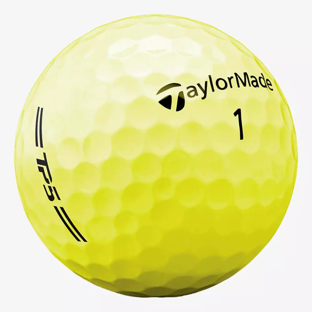 A yellow TaylorMade golf ball with the number 1, TPS branding, and black text and markings on its dimpled surface&mdash;perfect for pairing with the best golf shoes 2026 for an upgraded game.