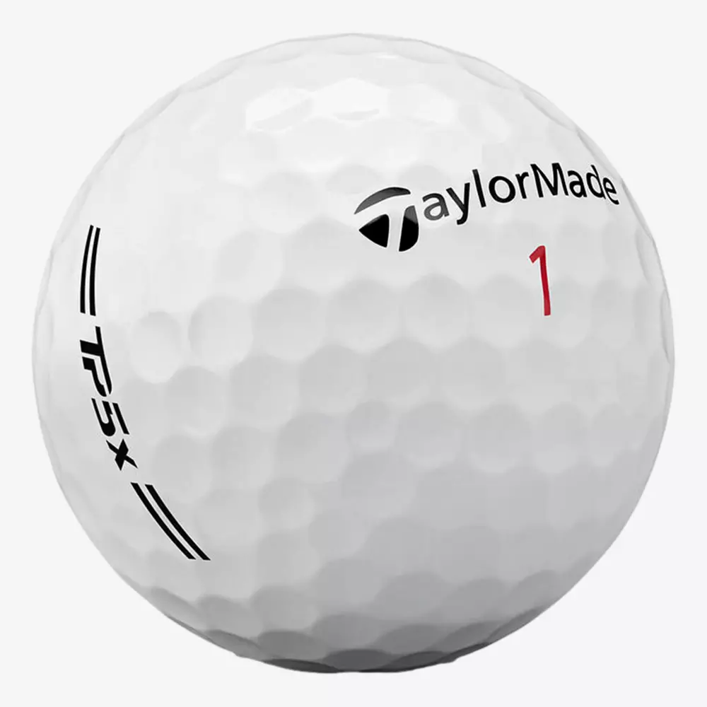A close-up of a white TaylorMade golf ball with the brand logo, the word TP5x, and the number 1 printed in red. The textured dimples are clearly visible&mdash;perfect for pairing with the best golf shoes 2026 on your next round.